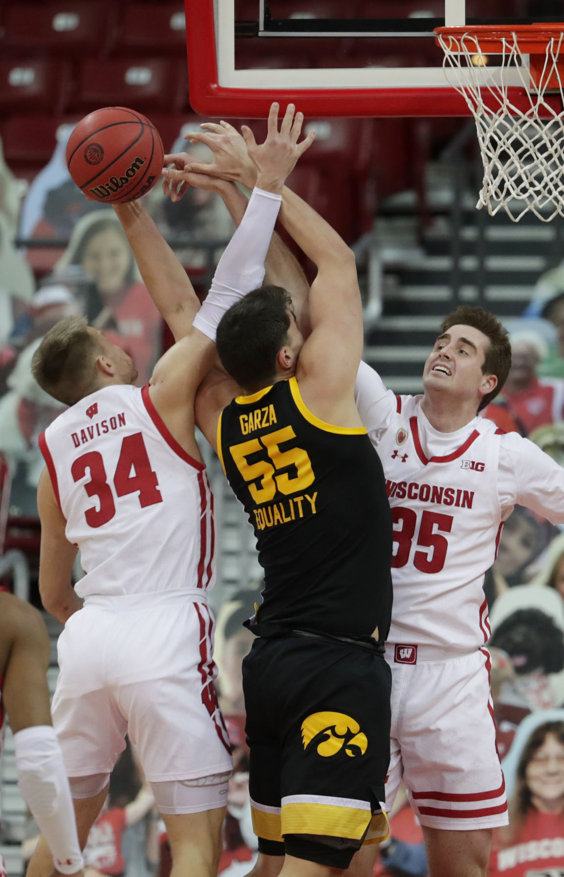 Iowa 77, UW 62